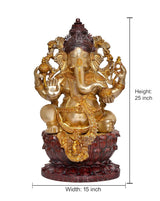 Seated Ganesha idol, height 25 in, width 15 in; gold-tone figure with dark red base