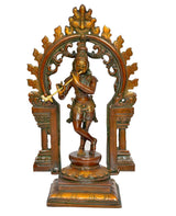 Brass Krishna playing flute idol with detailed arched frame and decorative crown
