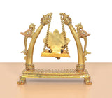 Brass Ganesha swing idol close view with ornate chains and decorative pedestal