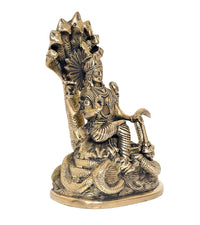Back/side view brass Vishnu idol on Sheshanaga, textured details and sculpted base