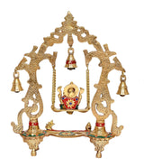 Brass Ganesha swing jhula showpiece viewed from front with hanging bell ornament