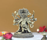 Panchmukhi Hanuman brass idol figurine, rear/side view with textured hair and ornaments