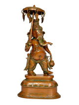 Brass Ganesha statue with parasol in one hand, detailed face, standing pose on base