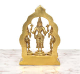 Rear view of brass Vishnu with Shridevi and Bhudevi, arched back panel over pedestal