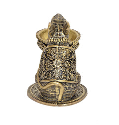 Brass mouse diya oil lamp, back view with floral engravings and shallow bowl