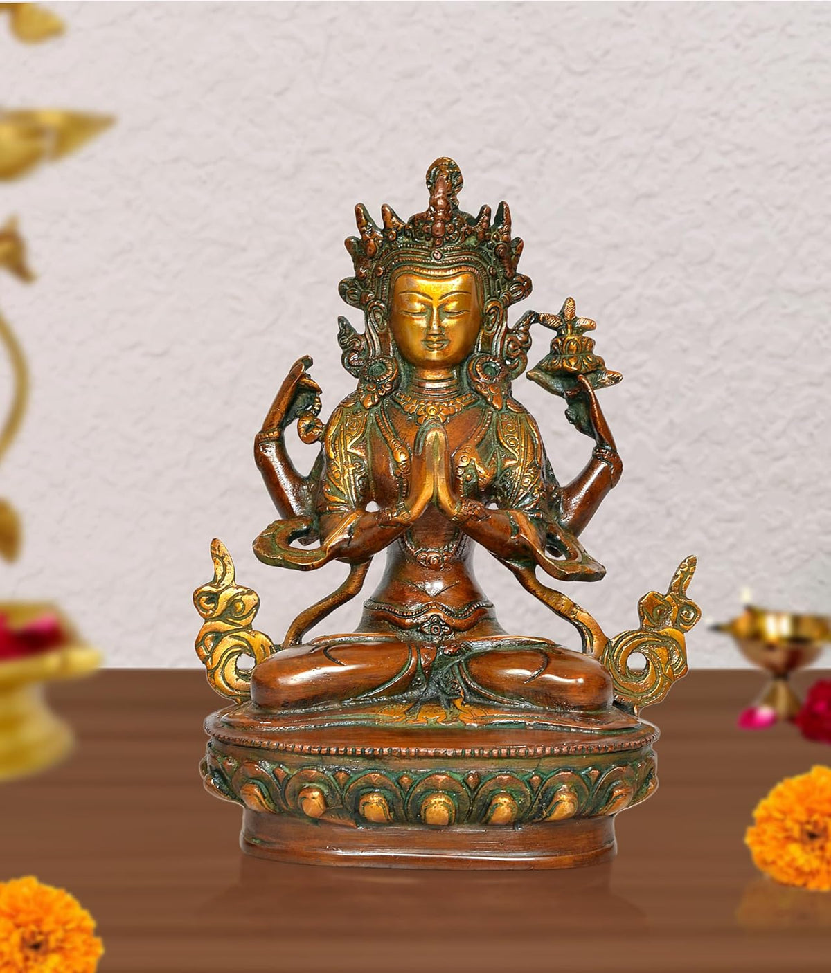 Brass Tara Devi statue with seated meditative pose, ornate halo and multi-armed details