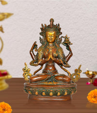 Brass Tara Devi statue with seated meditative pose, ornate halo and multi-armed details