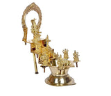 Brass Goddess Mariamma diya, side view of central idol with decorative stands