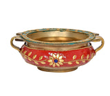 Red-and-gold brass urli with flower medallion, blue beaded rim, and two side grips