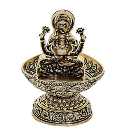 Brass Lakshmi diya oil lamp figurine, goddess and ornate tray top detail