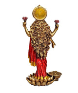 Back view of Maa Lakshmi resin idol, red sari with golden curly details, lotus base