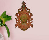 Tara mask statue wall hanging with ornate green face and bronze filigree details