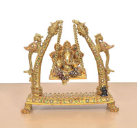 Front view brass Ganesha idol on swinging jhula with multicolor meenakari detailing