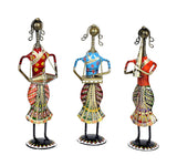 Iron musician lady set of 3, front view: red, blue and red embroidered dresses
