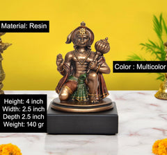 Resin Hanuman idol 4 inch, multicolor attire, on square dark base.