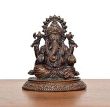 Bronze-toned Lord Ganesha murti seated, detailed jewelry and textured base