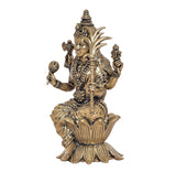 Brass Rajarajeshvari idol, side view, ornate jewelry and crown, lotus base, 4 in