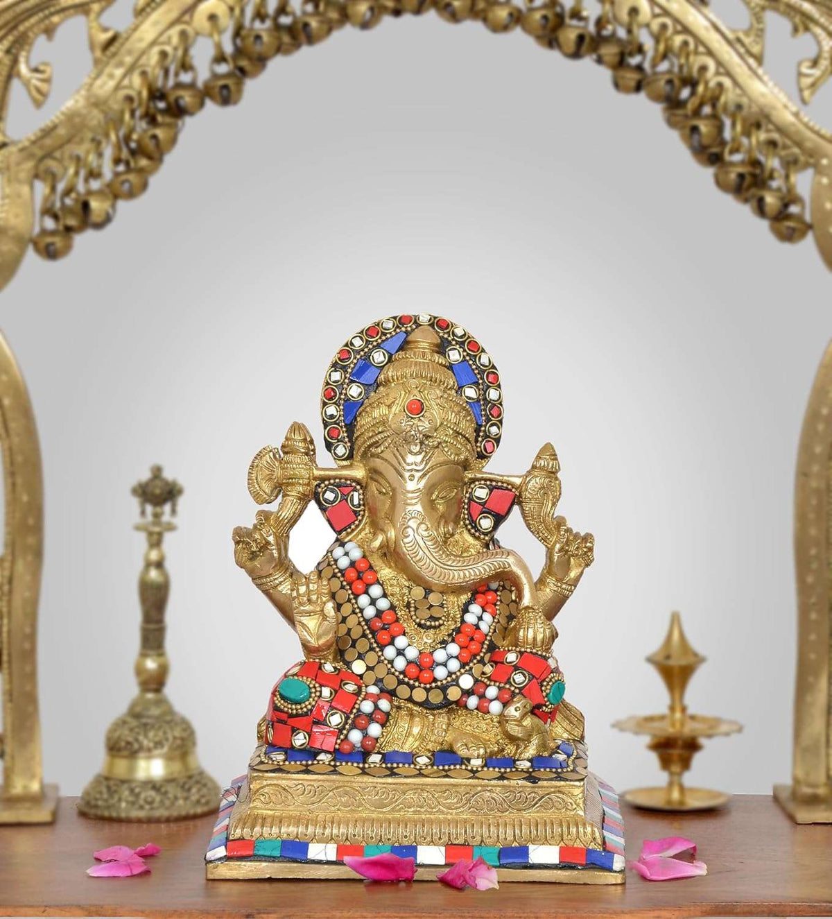 Brass Ganesha idol with multicolour beaded garland and jeweled crown, front view