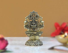 Brass Laxmi diya oil lamp with ornate filigree, 4-inch height
