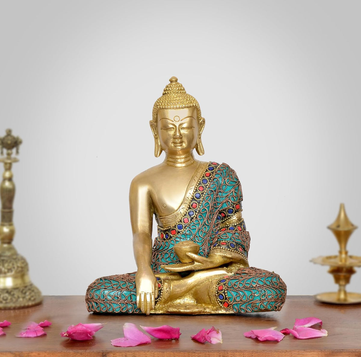Gold brass meditating Buddha statue in Dhyan mudra, turquoise and red beaded robe