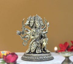 Brass Panchmukhi Hanuman idol figurine, angled view showing multiple heads and crown