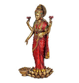 Maa Lakshmi resin statue in red sari with green blouse, diya bowl on lotus base