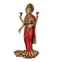 Maa Lakshmi resin statue in red sari with green blouse, diya bowl on lotus base