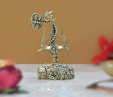 Brass Lord Shiva with trishul and damru on textured platform base
