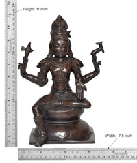 Lord Shiva statue with height 11 in and width 7.5 in; seated with trident arms, dark brass