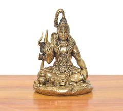 Brass Lord Shiva statue, seated blessing posture, trident at side, lion at base