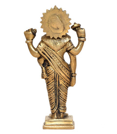 Brass Dhanvantri statue back view with sunburst headpiece and patterned draped robe