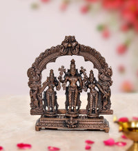 Copper Vishnu Shridevi and Bhudevi statue, ornate arch, three standing figures on base