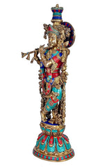 Radha Krishna brass sculpture figure, side view with ornate headdress and teal/red attire
