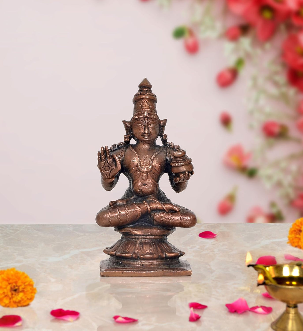 Copper Dhanvantari statue, seated lotus pose with raised hands, 3.5 inch height