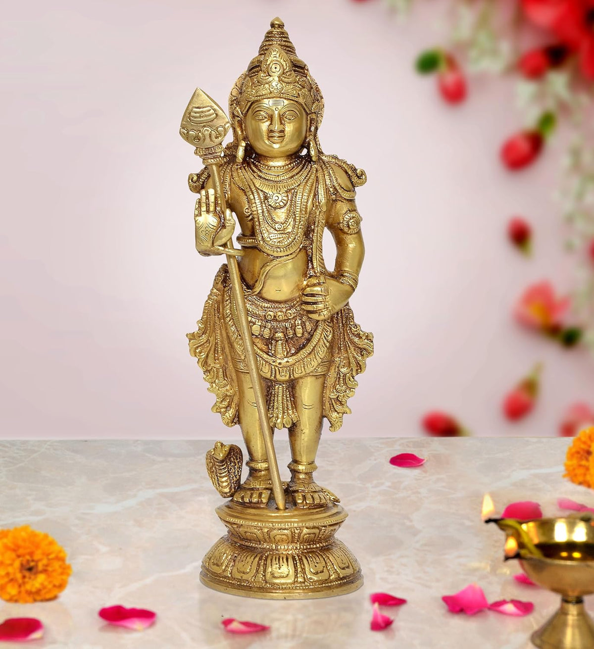Brass Lord Kartikeya statue standing, holding spear and trident with ornate details