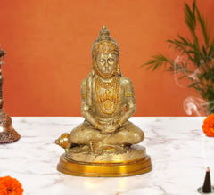 Brass Hanuman meditating idol, seated posture with carved detailing, golden finish
