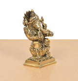 Brass Ganpati Bappa murti in side angle, detailed hands and seated patterned base
