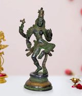 Ardhanrishvara (Shiva-Parvati) brass statue in dynamic dancing pose with green patina