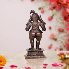 Bal-Krishna Figur kupferfarben, Rückansicht mit Schmuckelementen und Sockel