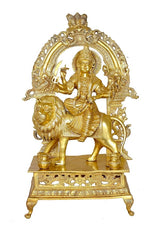 Brass Durga statue idol facing forward, holding weapon, mounted on lion