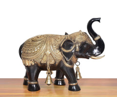 Brass elephant figurine, close side angle, gold chest details and hanging bell ornaments