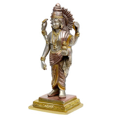 Brass Dhanvantari statue in profile, raised hands and draped robe with gold trim, square base
