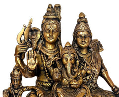 Brass Shiv Parivar statue close-up, crowned faces with detailed jewelry and ornaments