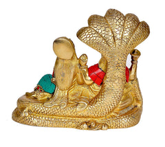 Brass Shesha Naga serpent base with Vishnu and Lakshmi seated, rear angle