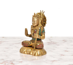 Brass Lord Shiva statue side view, folded hands, trident on round base