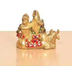 Brass nandi base with seated Shiv family, multicolor painted details