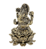 Ganesha brass idol side view, intricate face ornaments and lotus pedestal