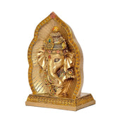 Resin Lord Ganesha idol, gold-toned, jeweled headpiece and trunk, side view