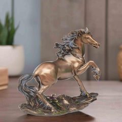 Polyresin running horse showpiece with bronze finish, rearing, floral base