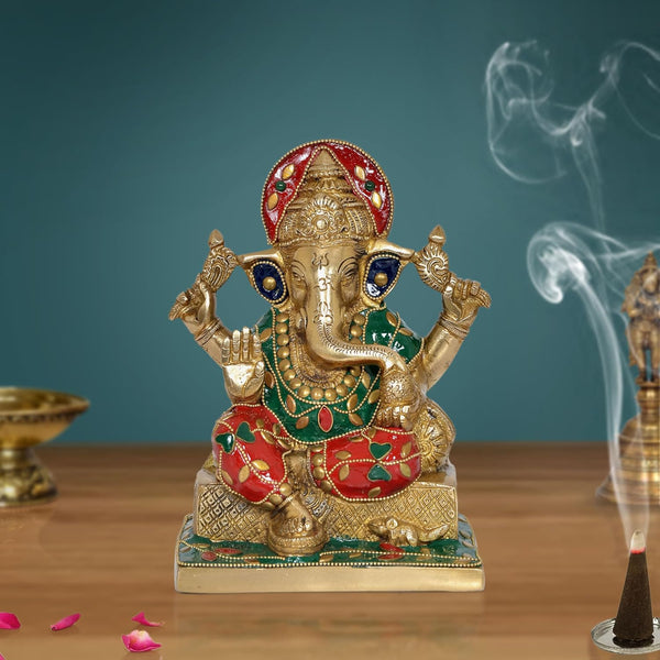 Brass Lord Ganesha Statue in green and red vastr (Height: 7 Inch)
